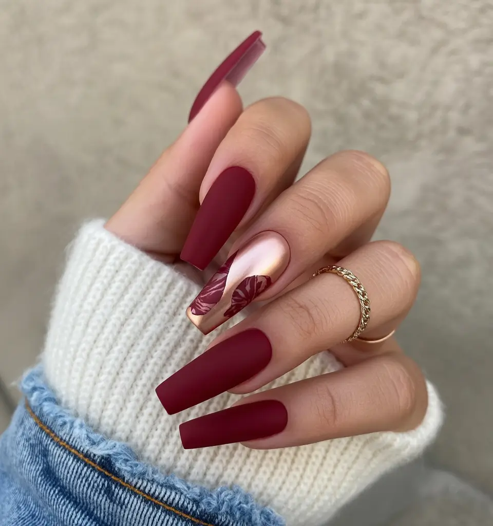 spring nail colors Matte Merlot Coffin Nails with Floral Accent