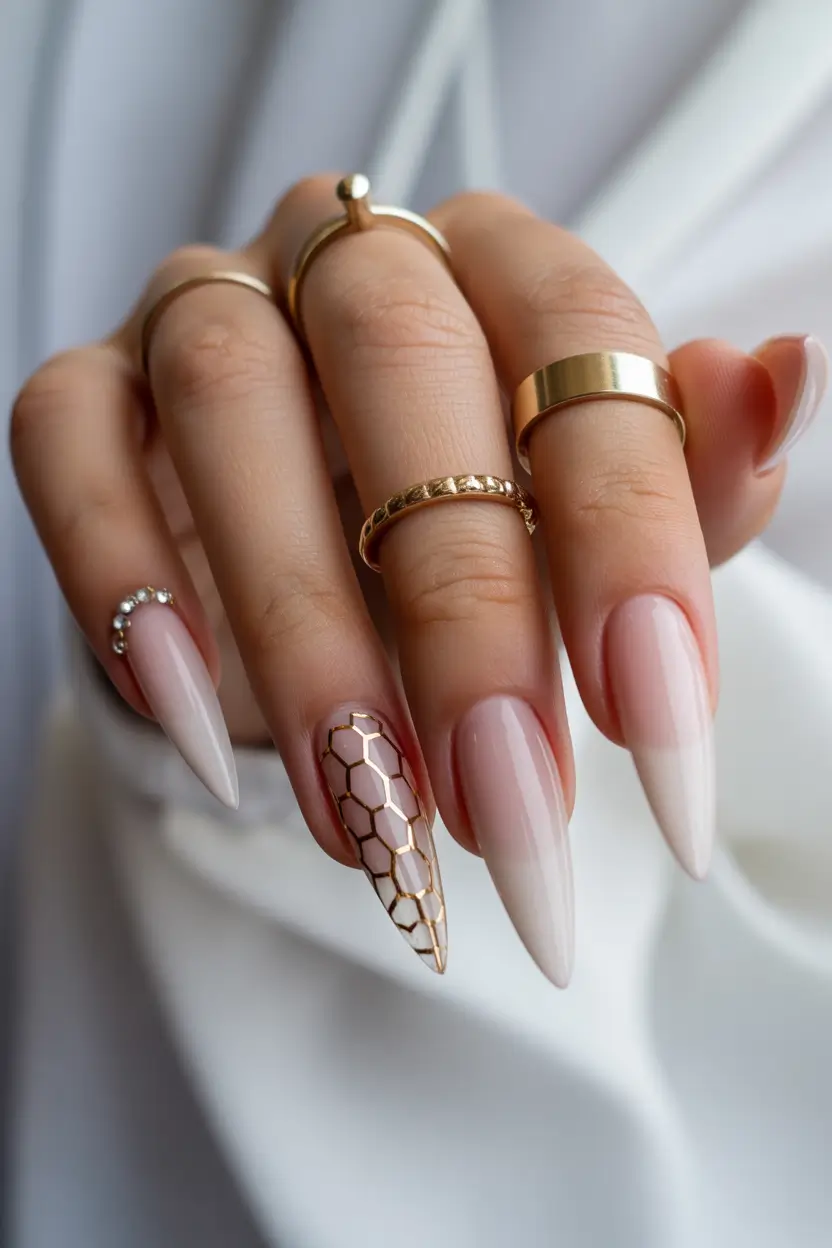 classy spring nails Milky White Stiletto Ombré with Gold Honeycomb - High-Fashion Bridal Energy