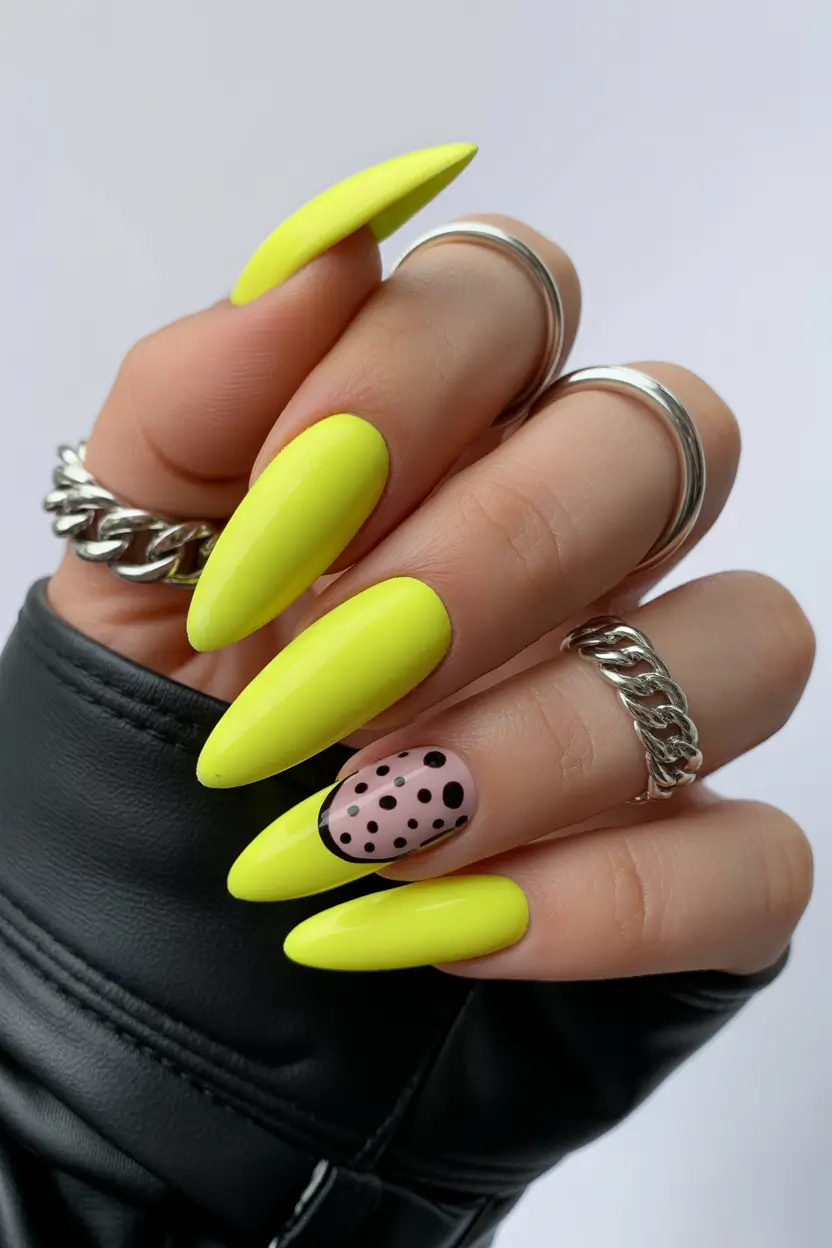 spring nails for brown skin Neon Yellow Almond Nails With Graphic Accent