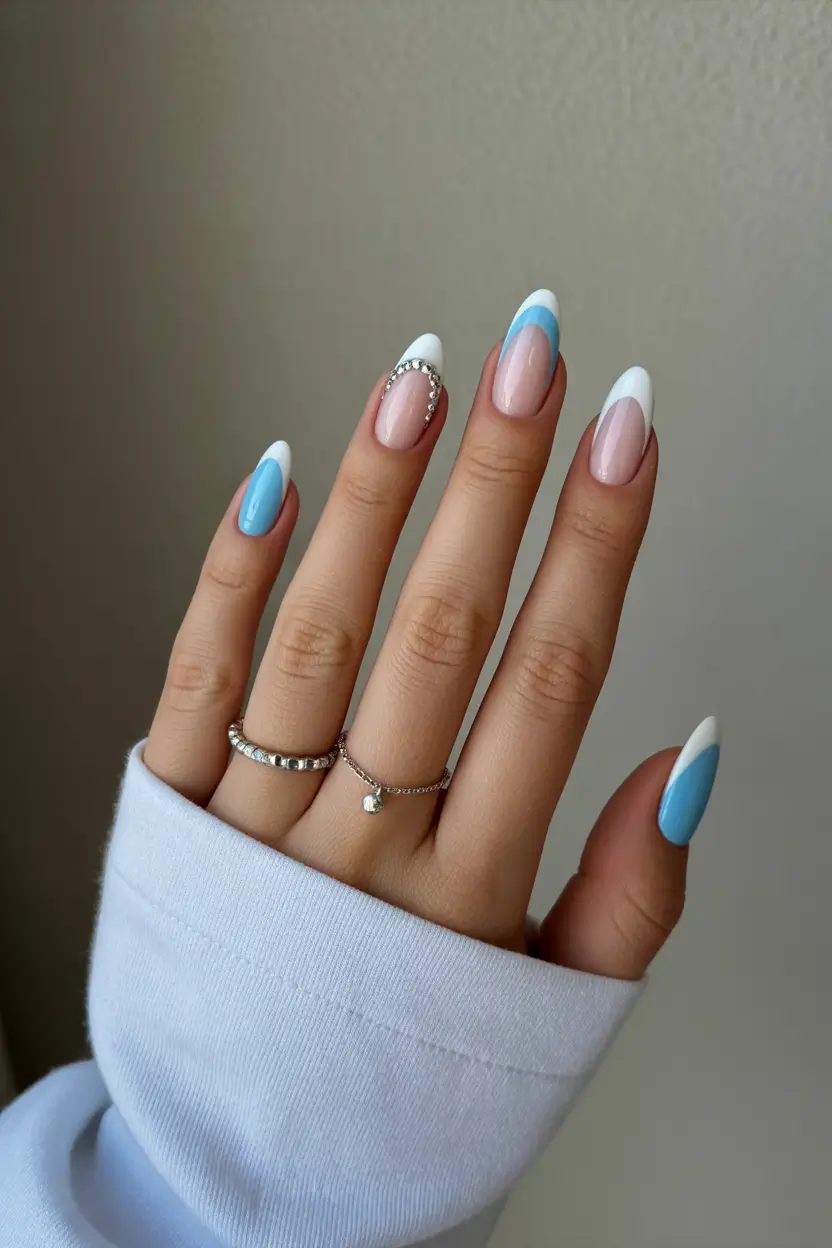 spring nails for brown skin Soft Blue French Tips With Crystal Accent