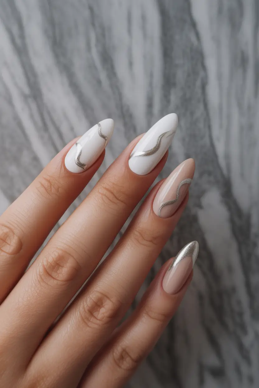 spring nails for pale skin Soft White Almond Nails With Delicate Silver Waves