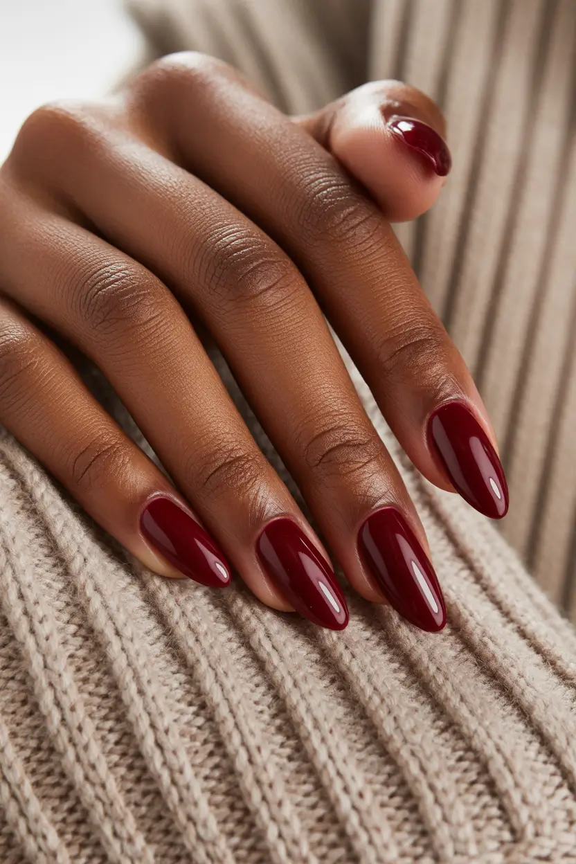 spring nails for dark skin Deep Burgundy Almond Nails With Rich Gloss Finish