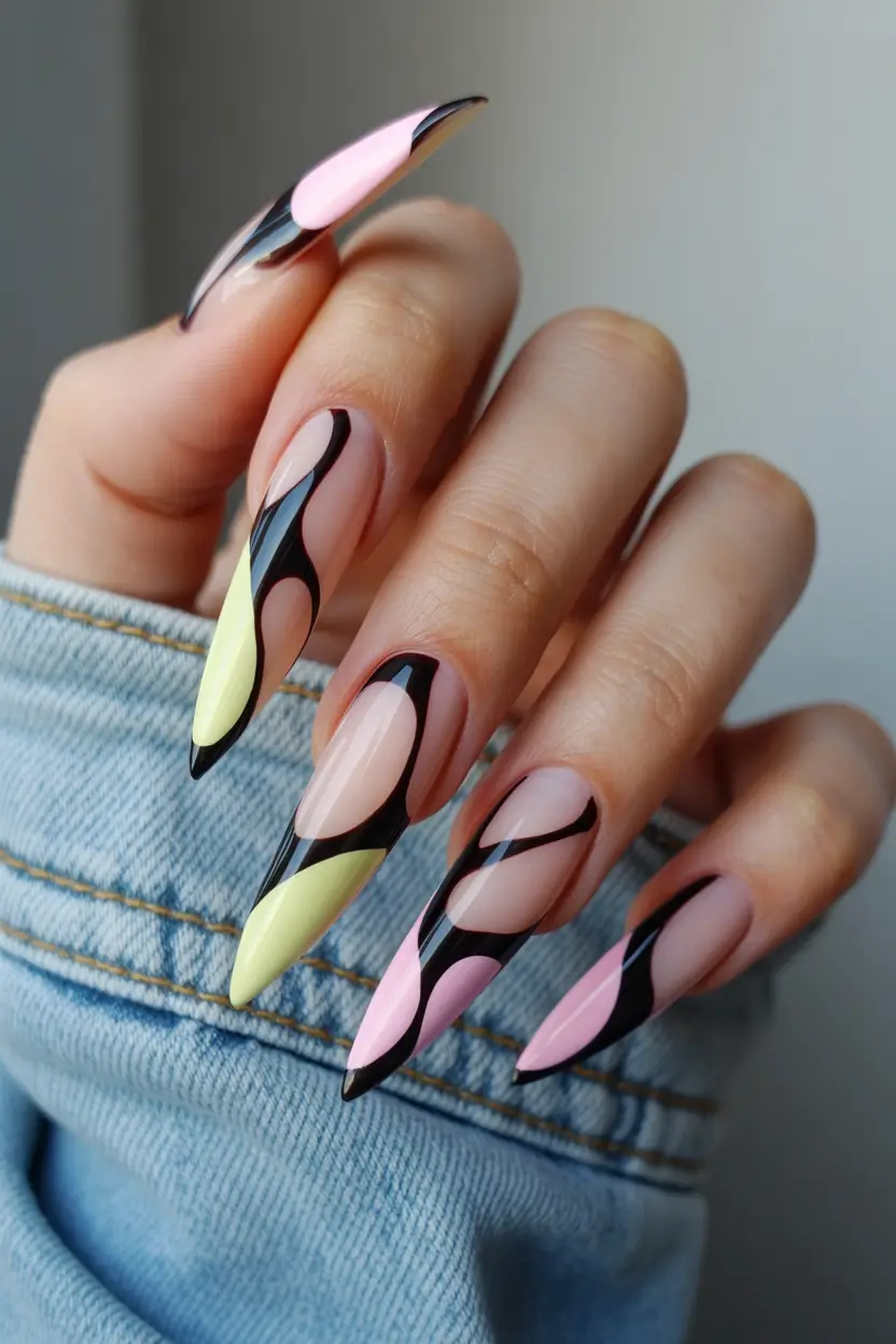 spring to summer season nail art ideas 2026 Modern Graphic Almond Nails With Soft Pastel Shapes