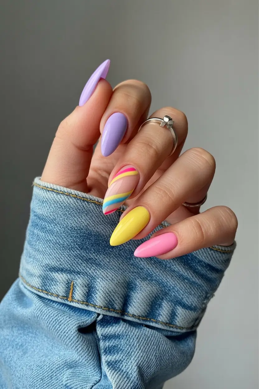 23 spring to summer season nails color ideas 2026 Diagonal Candy Stripe Nails With Modern Pastel Contrast