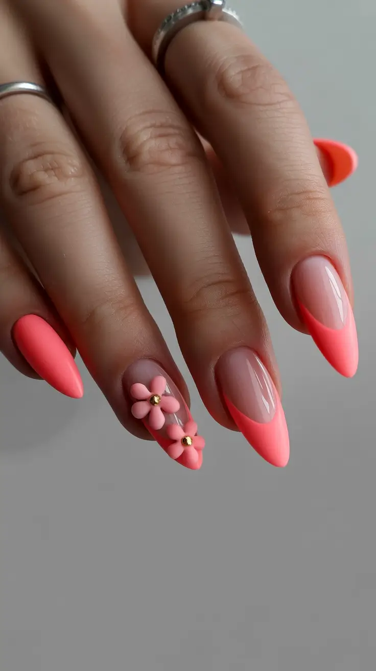 23 spring to summer season nails color ideas 2026 Coral French Tips With Sculpted Floral Accents