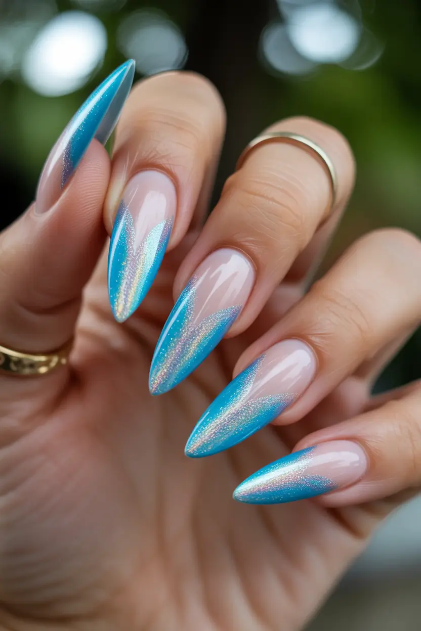 spring to summer season nails ideas 2026 Iridescent Aqua Chrome Stiletto Nails