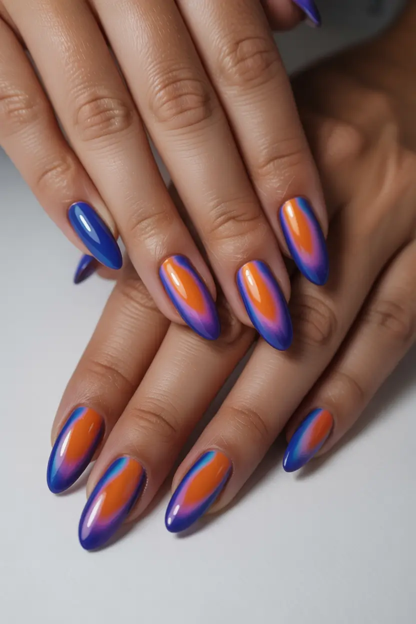 spring aura nails Electric Orange And Blue Aura Nails That Feel Bold For Spring