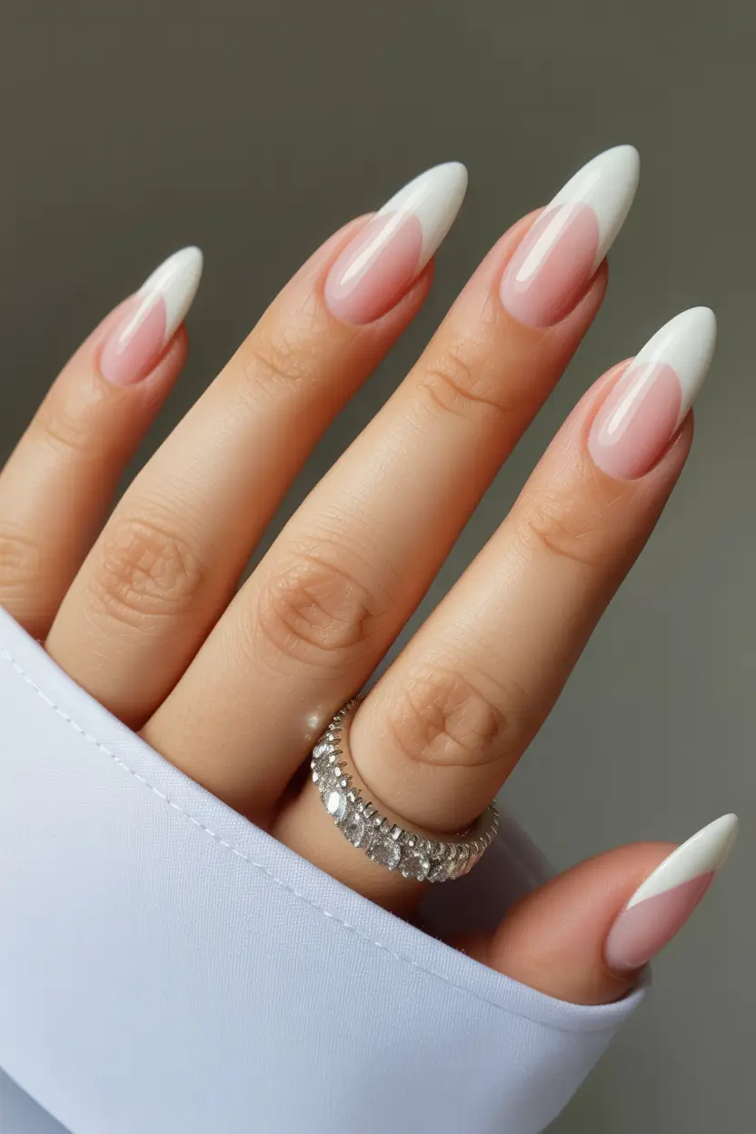 spring wedding nails Elegant Almond French Nails For A Timeless Bride Look